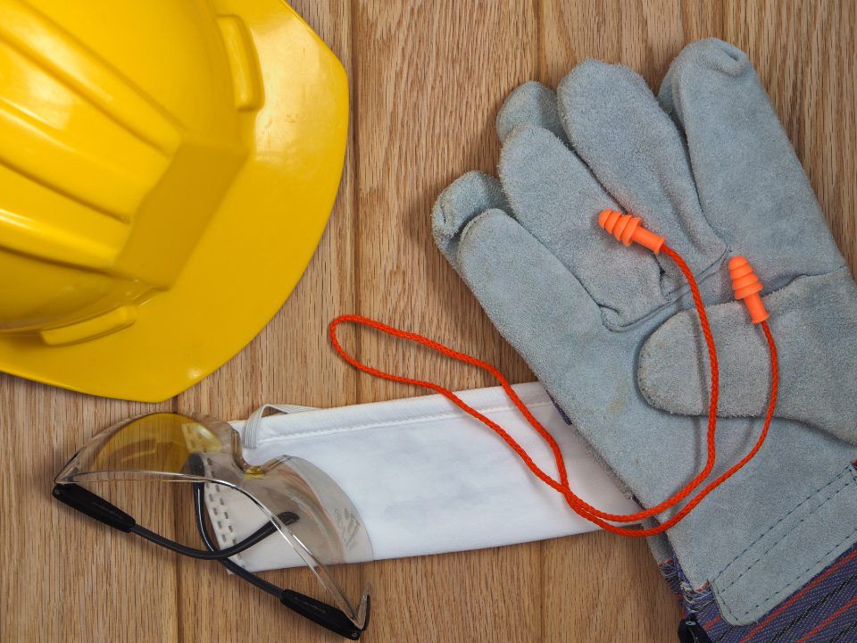 Hard hat, gloves and safety glasses